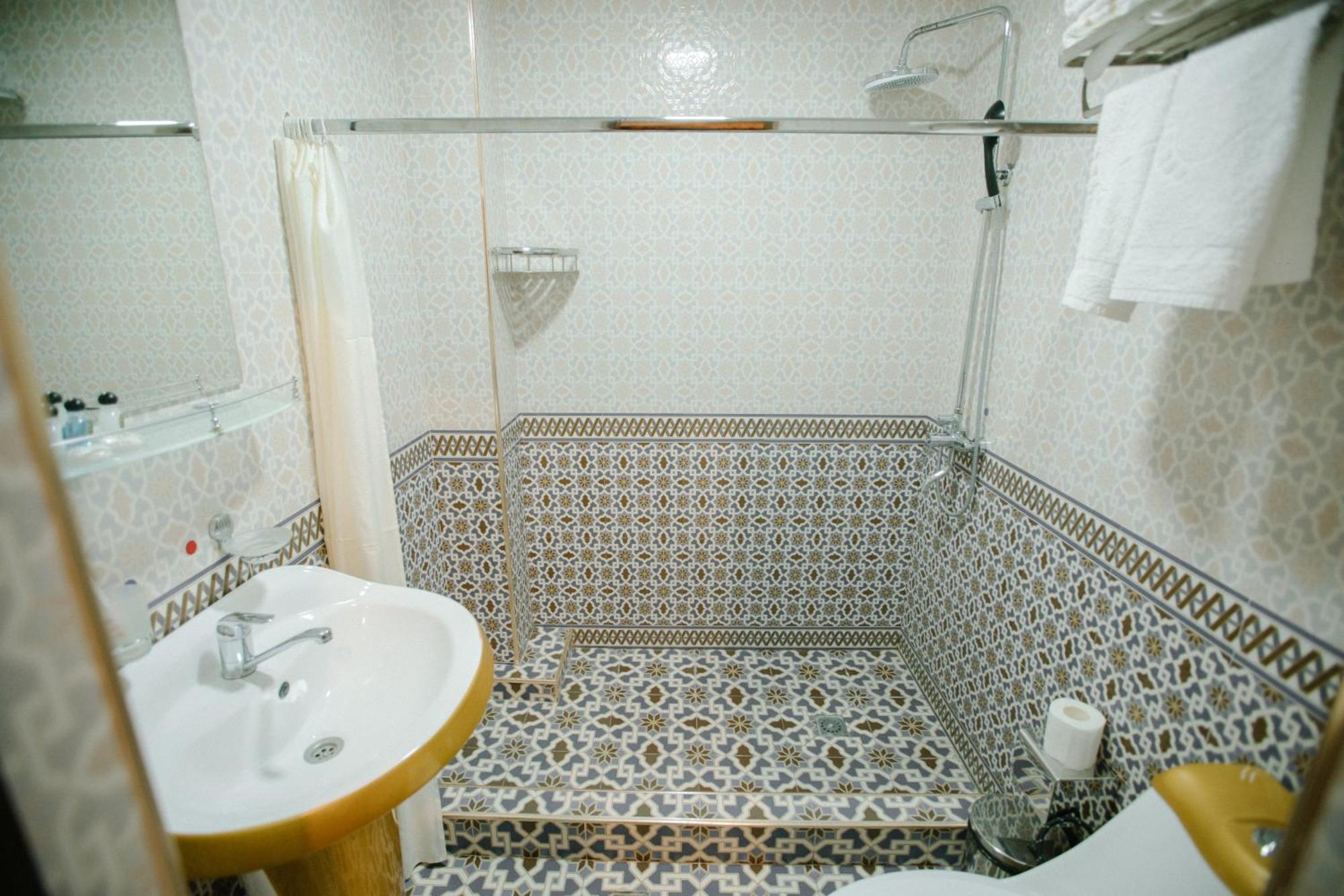 Dendi Plaza Hotel Buhara Exterior foto